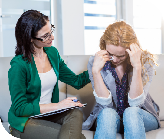 psychiatrist comforting the young woman