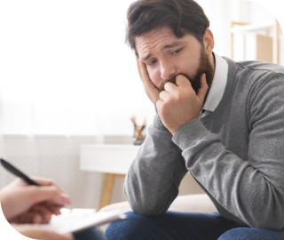 young man listening to psychiatrist