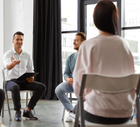 psychiatrist talking to young woman